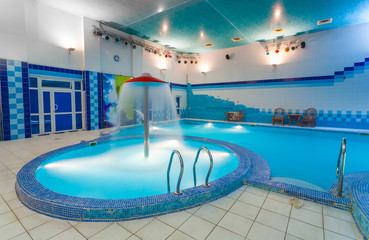 swimming pool and lanai with sitting area