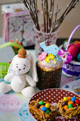 Easter's cake, eggs, candies and rabbit
