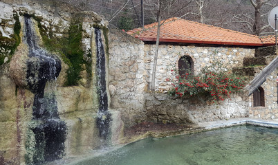 Fototapeta premium Waterfall and pool at Loutra Pozar