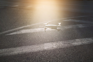drone flying at dusk