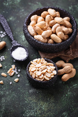 Raw peeled peanuts on bowl