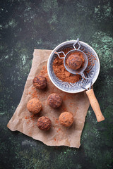Candy truffles with cocoa powder