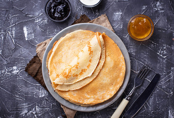 Pancakes crepes with different jam and cream - obrazy, fototapety, plakaty