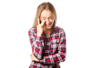 Woman in shirt  laughs happy cmiling wiping eyes
