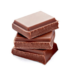 close up of chocolate pieces on white background
