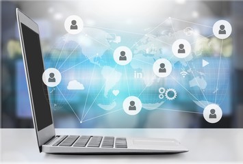 Laptop on tablet and abstract illustration