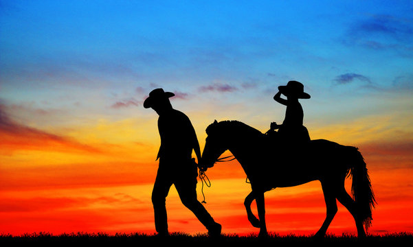 silhouette, girl riding a horse on the sunrise.