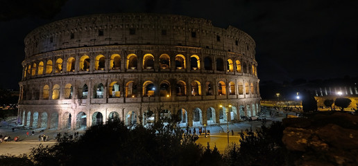 Ancient amphitheater Colosseum in the night