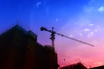The crane is working at the construction site © hanmaomin