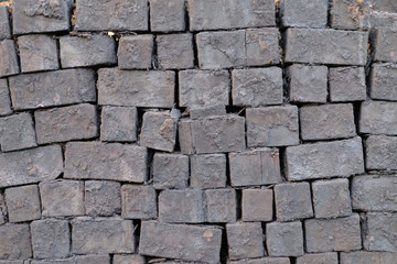 wood block covered with coal dust