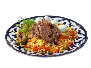 Pilau with eggs and vegetables. Traditional Uzbek cuisine, Middle East, Asia.