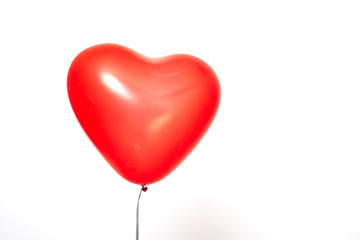 red heart balloons on a white