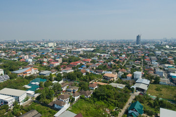 Fototapeta premium Aerial city view from flying drone at Nonthaburi, Thailand. top view of the city