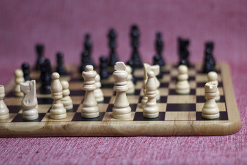 Play chess. Chess on a chessboard.