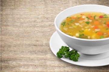 Vegetable soup on wooden table