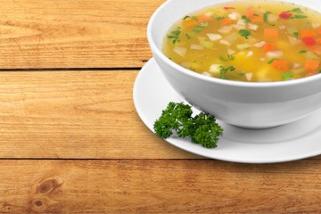 Vegetable soup on wooden table