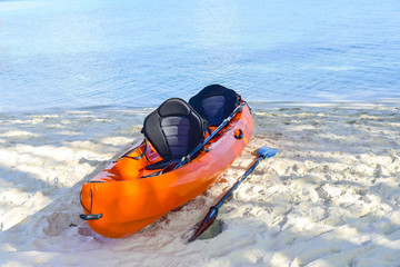 Kayak fishing boat parking on the beach