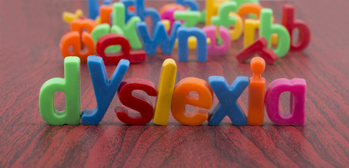 Dyslexia text with defocus of letters in background. - obrazy, fototapety, plakaty
