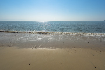 coast of china, at low tide the beach with sunlight