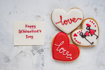 Cookies hearts with white and red icing Love for Valentine's Day