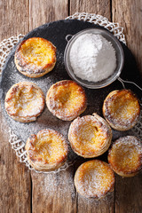 Portuguese pastries Pastel de nata with custard cream close-up. Vertical top view