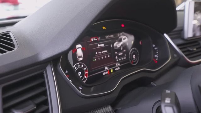Modern car interior, view of the dashboard and the speedometer of the new car.
