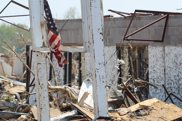 EF5 Tornado Damaged Home Flying an Amercn Flag in Defiance of the Disaster