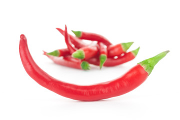 Red hot peppers on white background