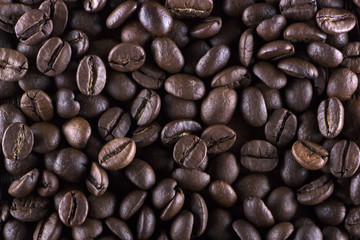 roasted coffee beans on wood texture