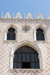 Fototapeta na wymiar St. Mark's Square in Venice, the beautiful details of the ancient architecture, The Doge's Palace