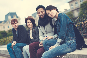 Multi-ethnic Group Of Friends Having Fun In Paris, Notre Dame