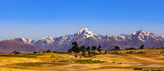 View of the Andes snow topped mountains in the Cuzco region of Peru