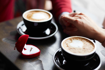 Valentine`s day concept. cup of coffee and heart are on the table