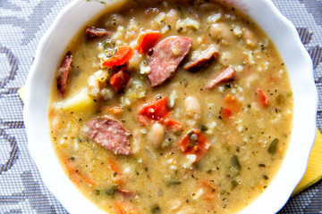 Traditional Russian soup solyanka closeup, view from above