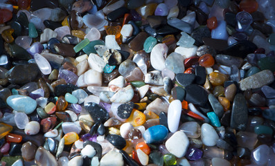 background from multicolored polished stones background