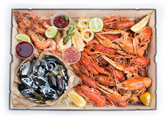 boiled crawfish, mussels, shrimps with sauces