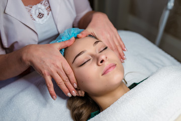 Obraz na płótnie Canvas Facial massage. Cosmetology.