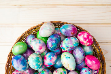 Easter eggs in a basket top view