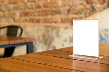 mock up menu object in cafe and restaurant,blank screen for booklet with white sheets of paper on wooden table on cafeteria,promotion and information for business mock up.