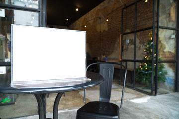 mock up menu object in cafe and restaurant,blank booklet with white sheets of paper on wooden table on cafeteria,promotion and information for business mock up.