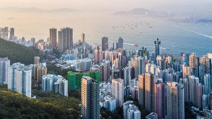 Aerial view shot from drone Victoria Harbour view from Victoria Peak, Hong Kong skyline cityscape, Victoria Peak, Hong Kong, China.