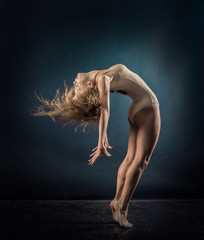 Obraz na płótnie Canvas One person, gymnastic, dancer, woman in dynamic beautiful action