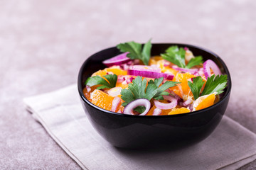 Italian Sicilian orange salad with onion, parsley. Copyspace, horizontal view.