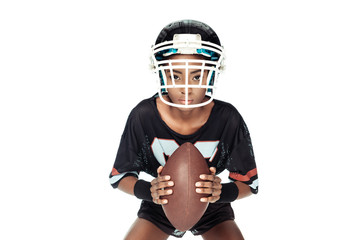 female american football player with ball looking at camera isolated on white