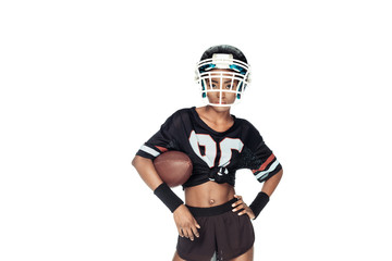 stylish female american football player with ball looking at camera isolated on white