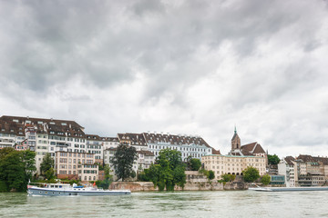 View of the River Rhine and the cathedral in the city of Basel. Switzerland.