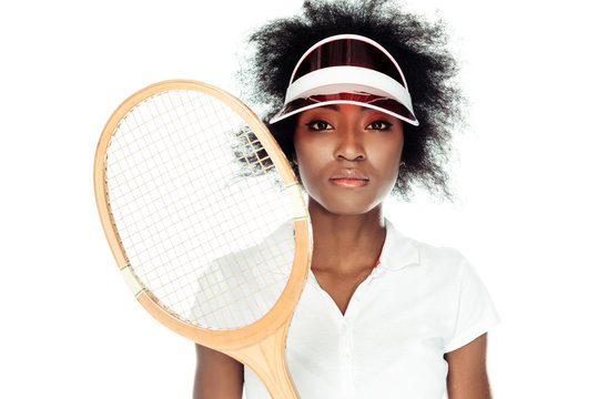 female tennis player in cap with racket isolated on white