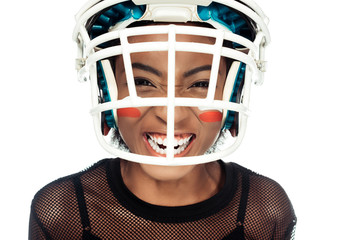 close-up portrait of expressive female american football player looking at camera isolated on white