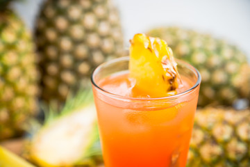 Sweet cocktail with pineapple and rum. Selective focus.