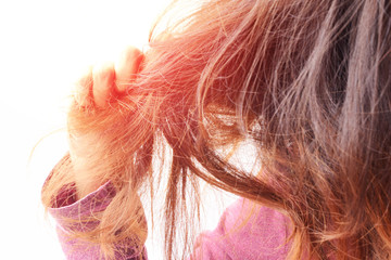 Damaged Hair. Beautiful Sad Young Woman With Long Disheveled Hair. Closeup Portrait Of Female Model Holding Messy Unbrushed Dry Hair In Hands. Hair Damage, Health And Beauty Concept. High Resolution